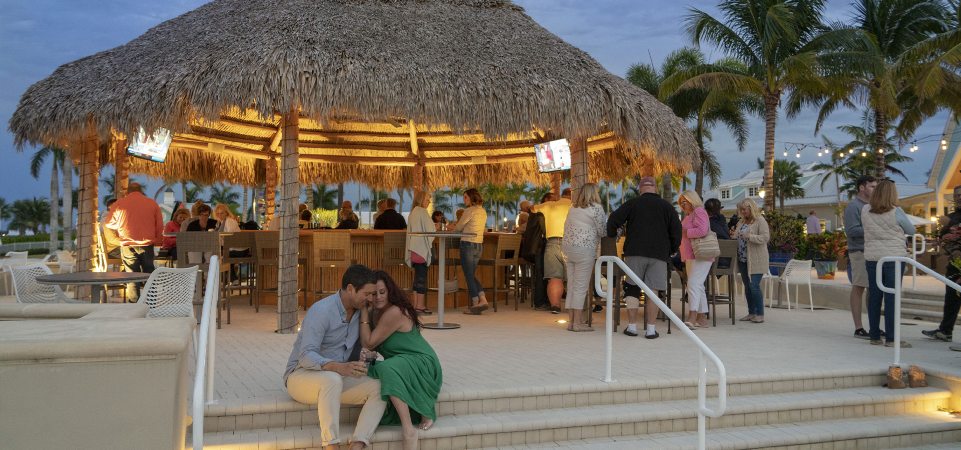 couple at the naples reserve tiki restaurant