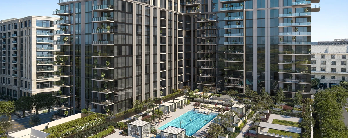 Modern residential high-rise with glass balconies, pool courtyard, cabanas, landscaped lawn, and pickleball court.