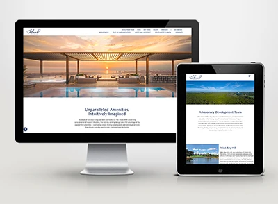 Desktop monitor and tablet showing responsive luxury real estate website pages.